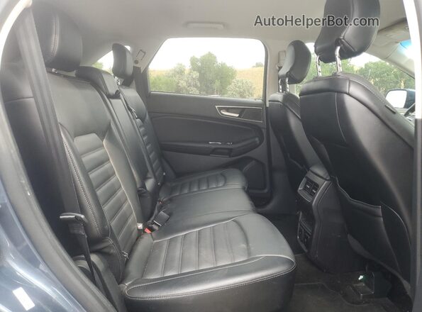2FMPK4J88JBB72647 2018 FORD EDGE Синий Вид задней части салона