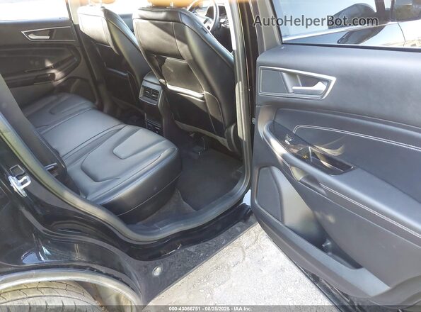 2FMPK4K99JBC19529 2018 FORD EDGE Black VIN კოდის სტიკერის ხედი