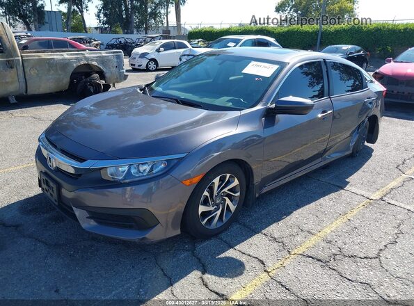 2HGFC2F77JH574000 2018 HONDA CIVIC Gray Передня ліва чверть