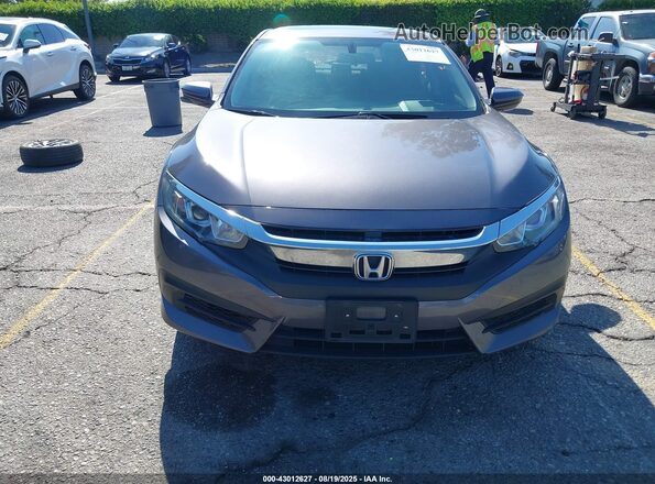 2HGFC2F77JH574000 2018 HONDA CIVIC Gray Вид задньої частини салону