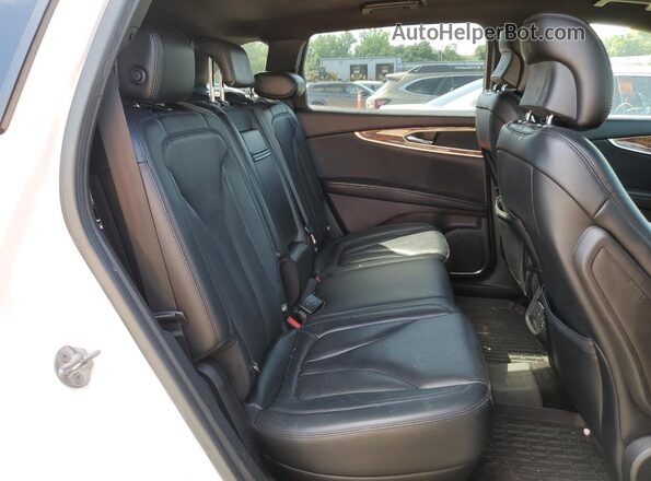 2LMPJ8LPXJBL18291 2018 LINCOLN MKX White Vista interior trasera