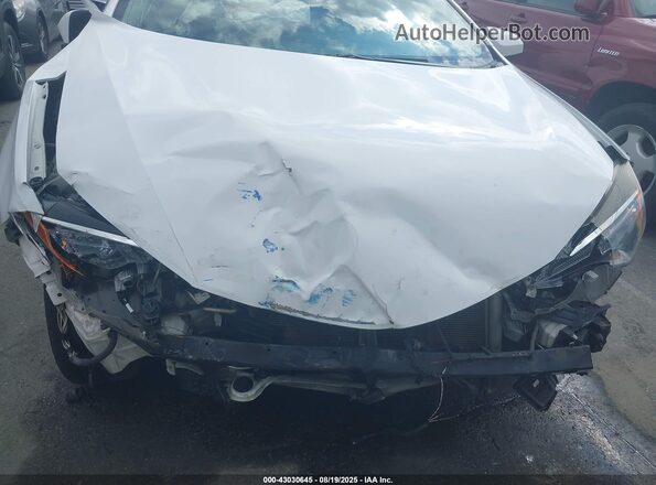 2T1BURHE0JC010603 2018 TOYOTA LL Белый Вид спереди