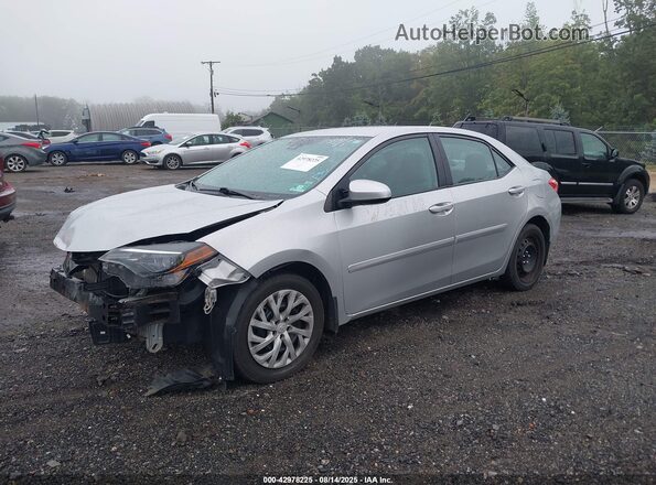 2T1BURHE8JC004399 2018 TOYOTA LL Серебряный Передняя левая четверть