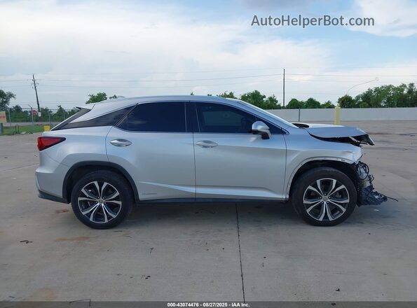 2T2BGMCA4GC005987 2016 LEXUS RX 450H Silver Rear interior view
