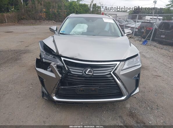 2T2BZMCA8JC164125 2018 LEXUS RX 350 Champagne Սարքավորումների վահանակի տեսք