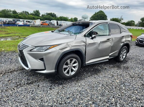 2T2BZMCA9JC153781 2018 LEXUS RX Silver წინა მარცხენა ხედი სამი მეოთხედიდან