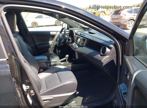 2T3JFREV5JW821426 2018 TOYOTA RAV4 Black Widok wnętrza z przodu