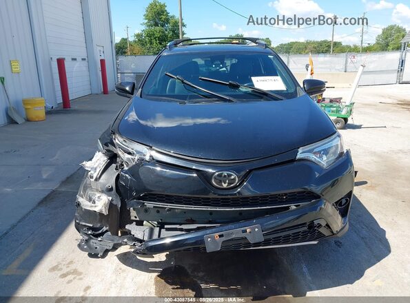 2T3JFREV5JW821426 2018 TOYOTA RAV4 Black Widok wnętrza z tyłu
