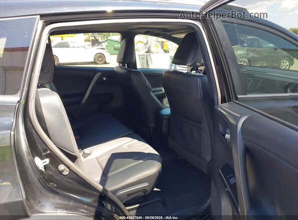2T3JFREV5JW821426 2018 TOYOTA RAV4 Black Widok naklejki z numerem VIN