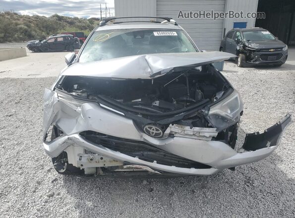 2T3RFREV0JW800860 2018 TOYOTA RAV4 Серебряный Вид спереди