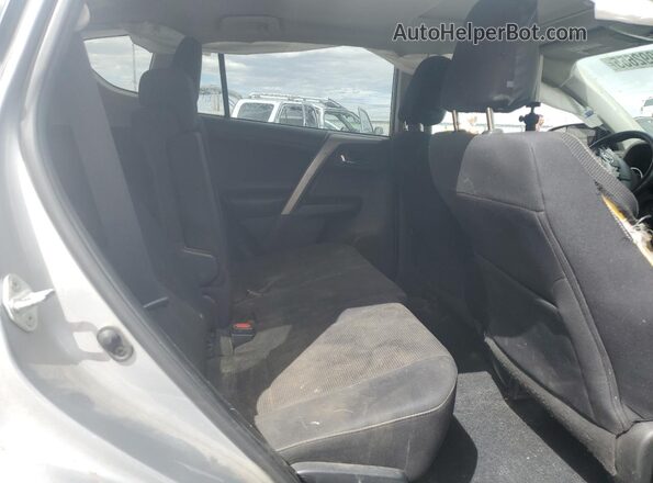 2T3RFREV0JW800860 2018 TOYOTA RAV4 Серебряный Вид задней части салона