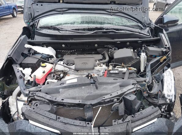 2T3RFREV1JW706180 2018 TOYOTA LE Blue Widok z tyłu