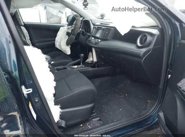 2T3RFREV1JW706180 2018 TOYOTA LE Blue Widok wnętrza z przodu