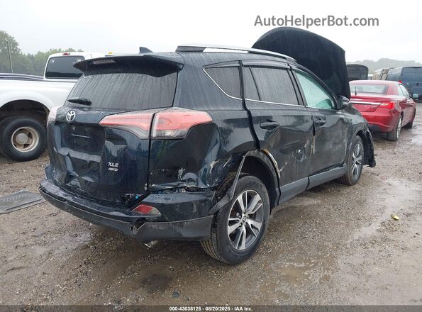 2T3RFREV1JW706180 2018 TOYOTA LE Blue Widok z przodu