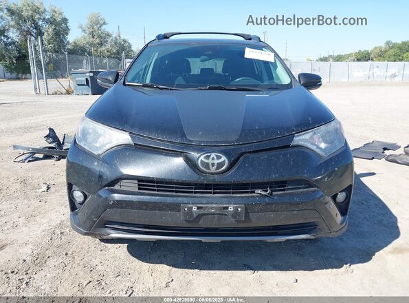 2T3RFREVXJW722524 2018 TOYOTA RAV4 Black Սարքավորումների վահանակի տեսք
