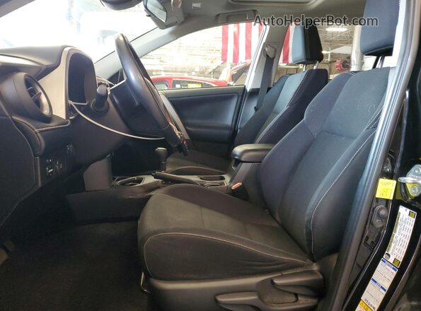 2T3RFREVXJW736469 2018 TOYOTA RAV4 Черный Вид салона спереди