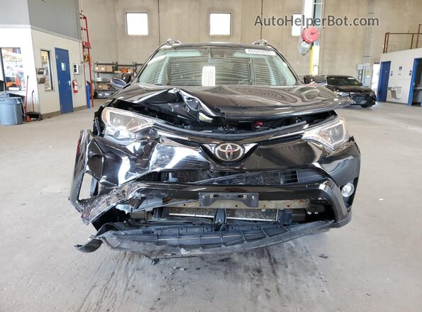 2T3RFREVXJW736469 2018 TOYOTA RAV4 Черный Вид спереди
