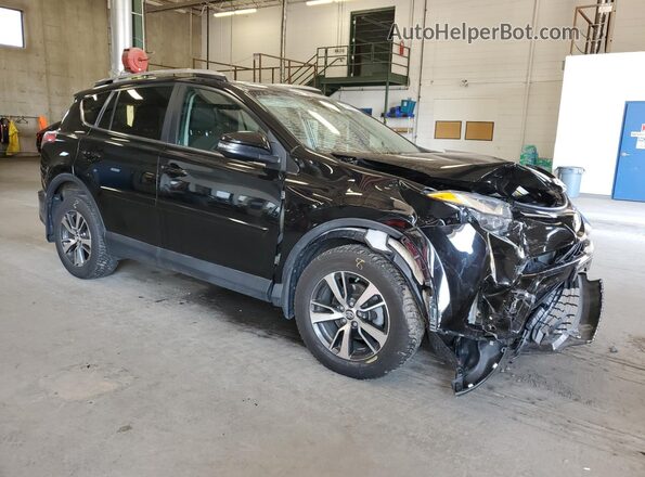2T3RFREVXJW736469 2018 TOYOTA RAV4 Черный Передняя правая четверть