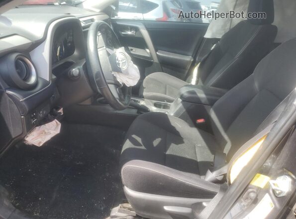 2T3RFREVXJW795666 2018 TOYOTA RAV4 Gray Вид салону спереду