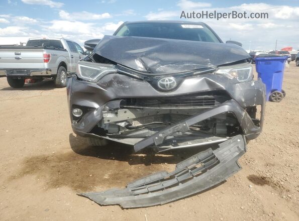 2T3RFREVXJW795666 2018 TOYOTA RAV4 Gray Вид спереду