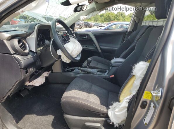 2T3WFREV6JW407299 2018 TOYOTA RAV4 Silver Widok wnętrza z przodu