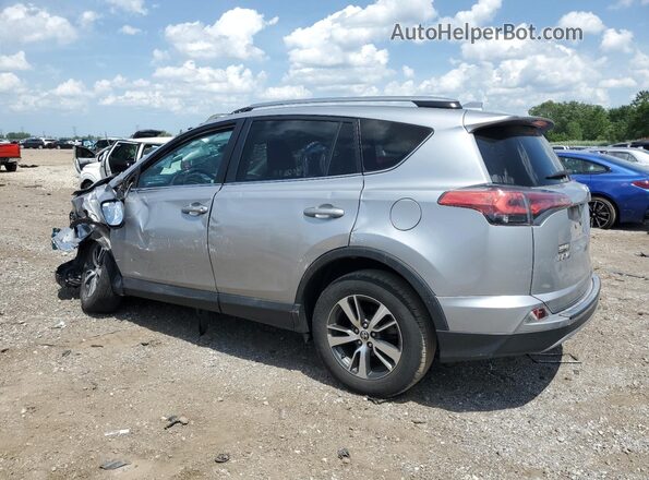 2T3WFREV6JW407299 2018 TOYOTA RAV4 Silver Tył lewy