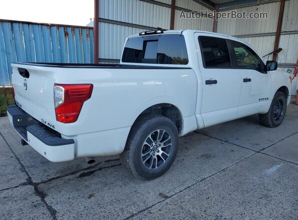 1N6AA1EC6RN103852 2024 NISSAN TITAN Белый Передняя правая четверть
