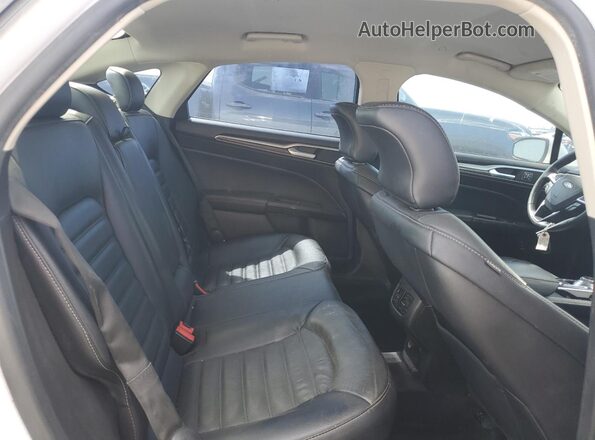 3FA6P0LU9JR171387 2018 FORD FUSION White Vista de los asientos traseros