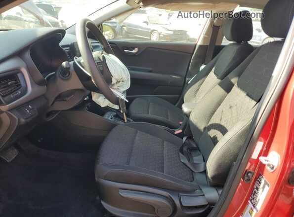 3KPA25AB2JE094564 2018 KIA RIO Red Front interior view