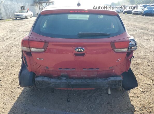 3KPA25AB2JE094564 2018 KIA RIO Red Rear view