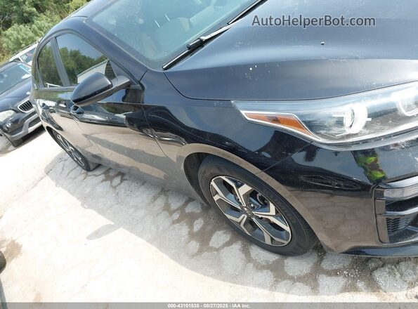3KPF24AD2ME330555 2021 KIA FORTE Black Rear interior view