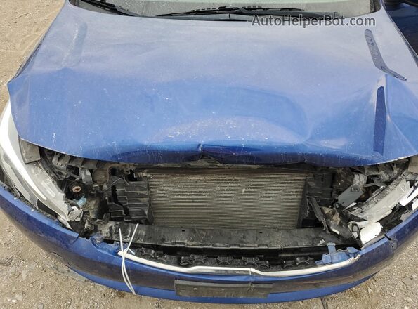 3KPFL4A74JE220075 2018 KIA FORTE Blue Rear interior view