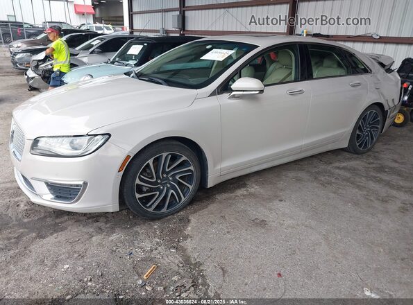 3LN6L5LU5LR609257 2020 LINCOLN MKZ Champagne Przód lewy