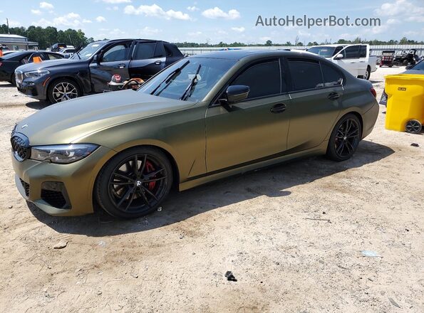 3MW5U7J01N8C48897 2022 BMW M3 Green Առջևի ձախ երեք քառորդ տեսարան