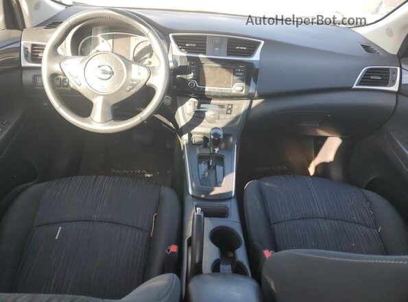 3N1AB7AP4JY259622 2018 NISSAN SENTRA Серый Вид панели приборов