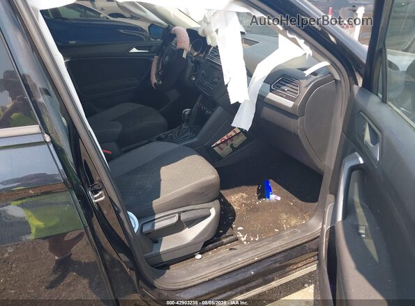 3VV0B7AX7MM044483 2021 VOLKSWAGEN TIGUAN Black Front interior view