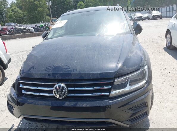 3VV3B7AX7MM030418 2021 VOLKSWAGEN TIGUAN Black ხელსაწყოთა პანელის ხედი