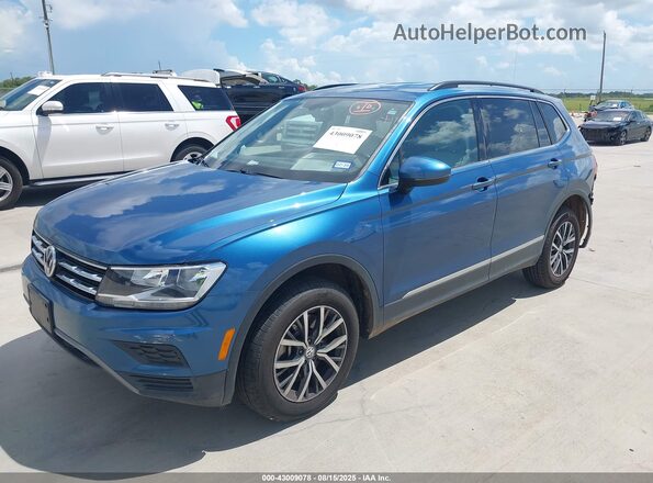 3VV3B7AX8JM188259 2018 VOLKSWAGEN TIGUAN Blue Առջևի ձախ երեք քառորդ տեսարան