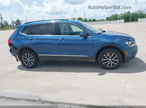 3VV3B7AX8JM188259 2018 VOLKSWAGEN TIGUAN Blue Սալոնի հետևի տեսք