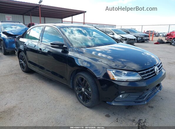 3VWD17AJ5JM209986 2018 VOLKSWAGEN JETTA Black Front right