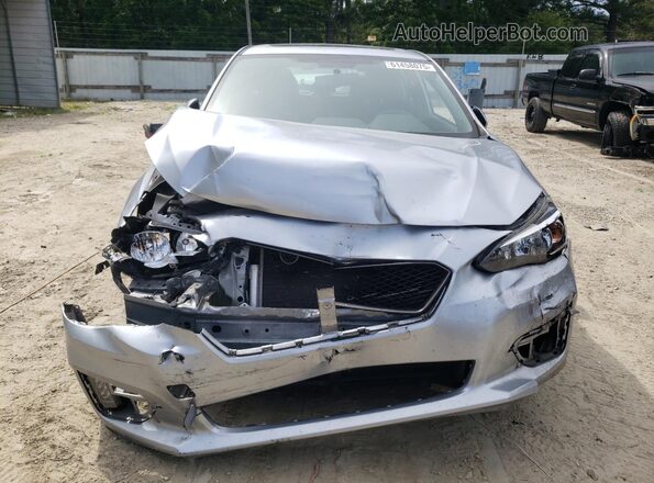 4S3GTAM64J3707497 2018 SUBARU IMPREZA Серебряный Вид спереди
