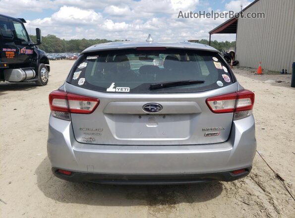 4S3GTAM64J3707497 2018 SUBARU IMPREZA Серебряный Вид сзади