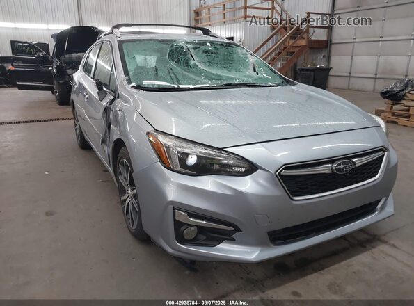 4S3GTAT69J3723065 2018 SUBARU IMPREZA Серебряный Передняя правая четверть
