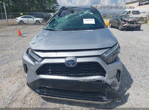 4T3E6RFV1PU117247 2023 TOYOTA RAV4 HYBRID Серебряный Вид задней части салона
