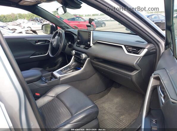4T3E6RFV4MU037274 2021 TOYOTA RAV4 HYBRID Silver Widok wnętrza z przodu
