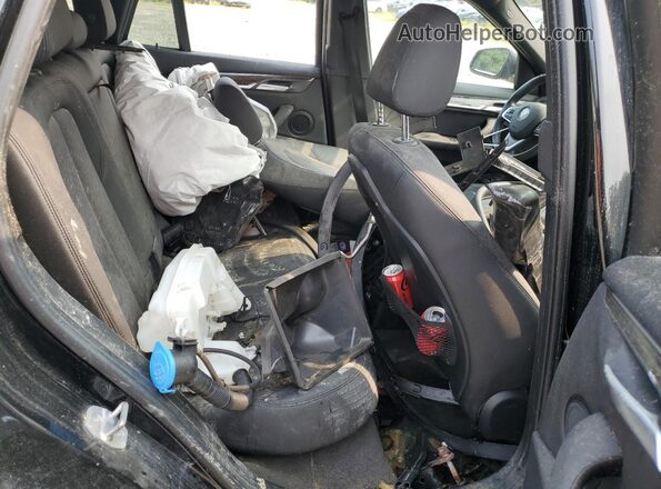 WBXJG7C04M5S29555 2021 BMW X1 Черный Вид задней части салона