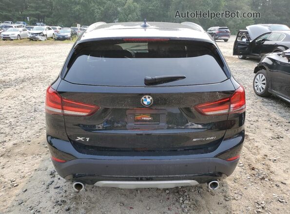 WBXJG7C04M5S29555 2021 BMW X1 Черный Вид салона спереди