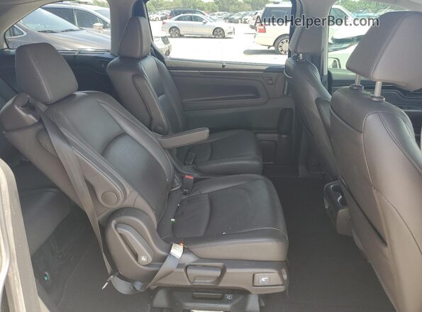 5FNRL6H92JB059140 2018 HONDA ODYSSEY Brown Widok wnętrza z tyłu