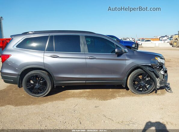 5FNYF5H23MB038446 2021 HONDA PILOT Gray Widok wnętrza z tyłu