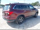 2021 Honda Pilot 2wd Touring 7 Passenger Maroon vin: 5FNYF5H69MB008726